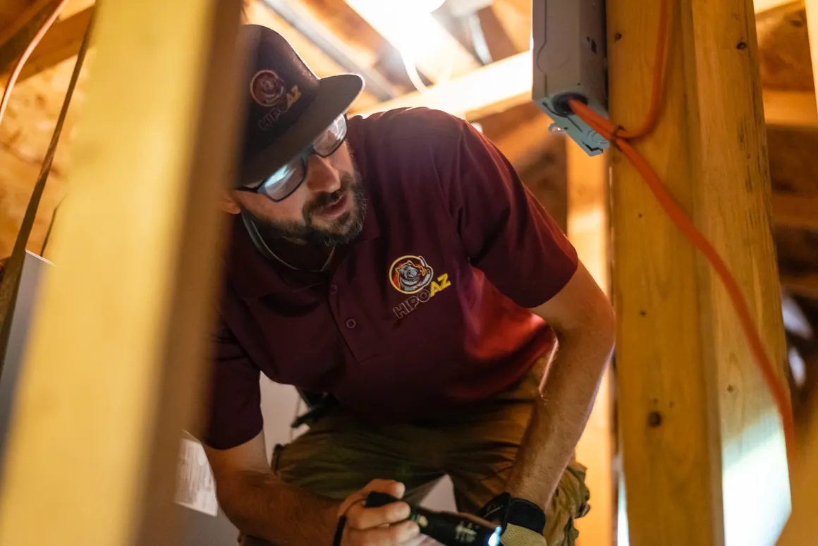 Craig Bachler a Licensed Arizona Home Inspector conducts an attic inspection